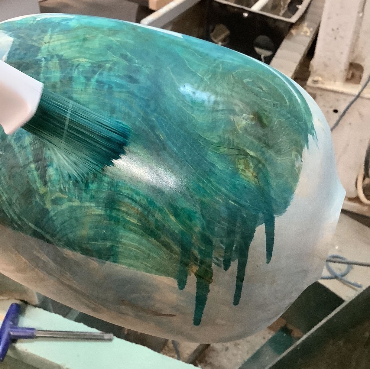 coloured dye being added to enhance the figure of one of our handmade wooden urns for ashes